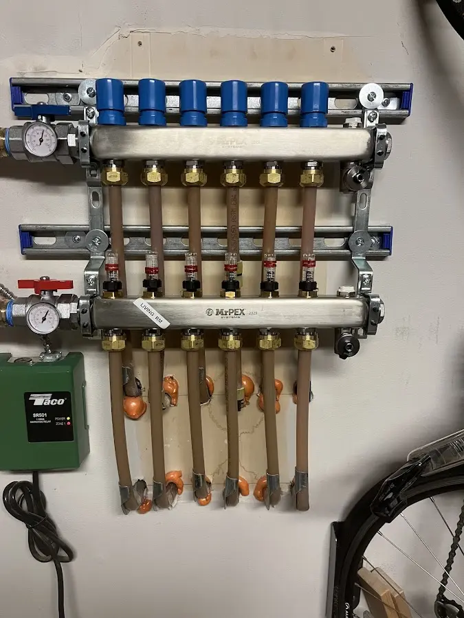 Plumber performing Water Heater Repair at a residential property in Cascade